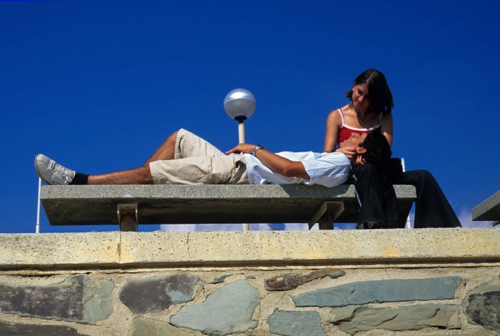 Passionate love in front of a lamppost